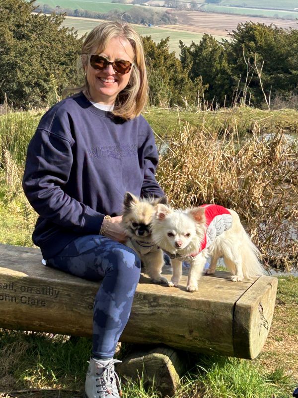 A picture of Jill with her two dogs